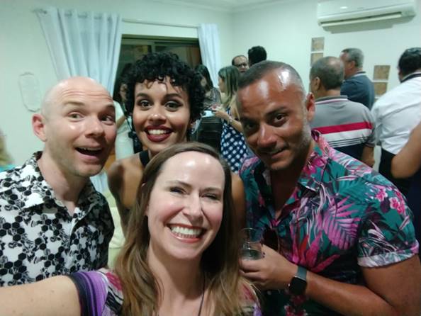 A group of people posing for the camera

Description automatically generated